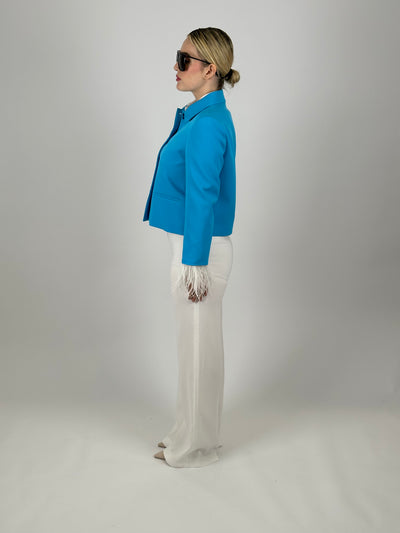 Veste Bleu élégante avec détails en plumes blanches